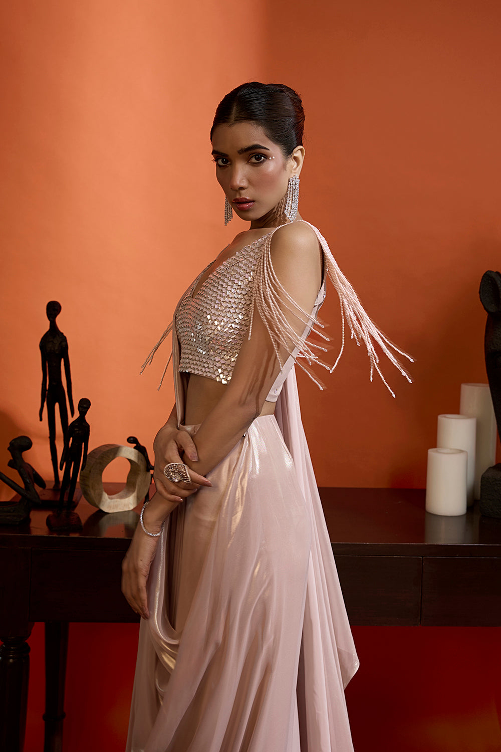 Metallic Blush Drape Saree Coupled with an Embellished Blouse