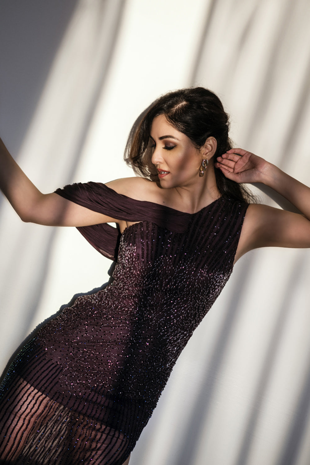 Pooja Chopra in Wine One Shoulder Gown