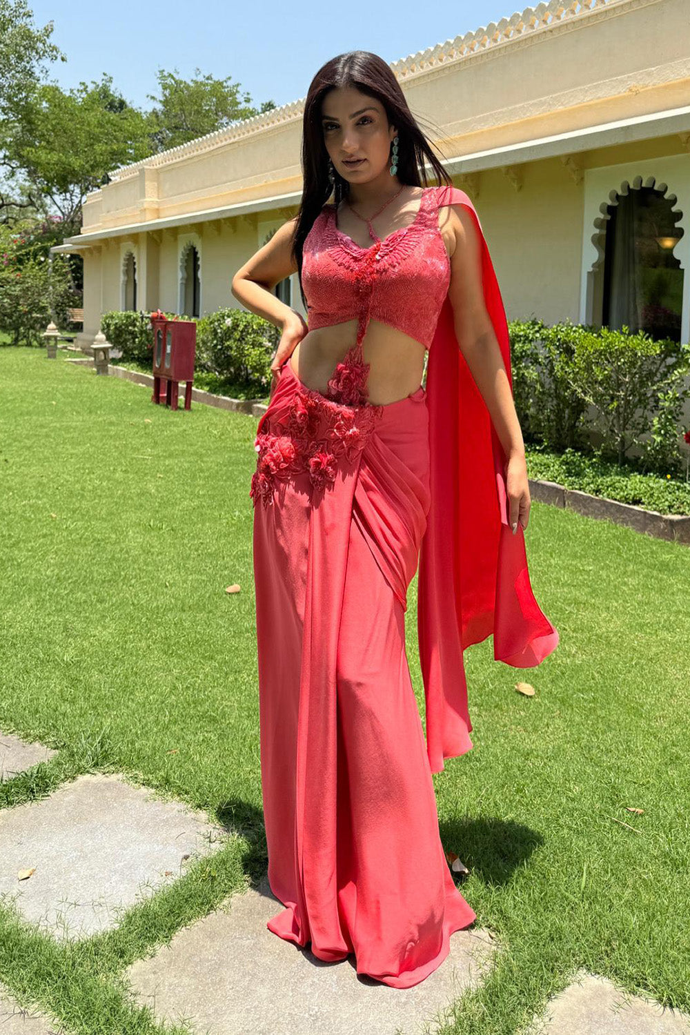 Rupali Jagga in Coral Sculpted Drape Saree