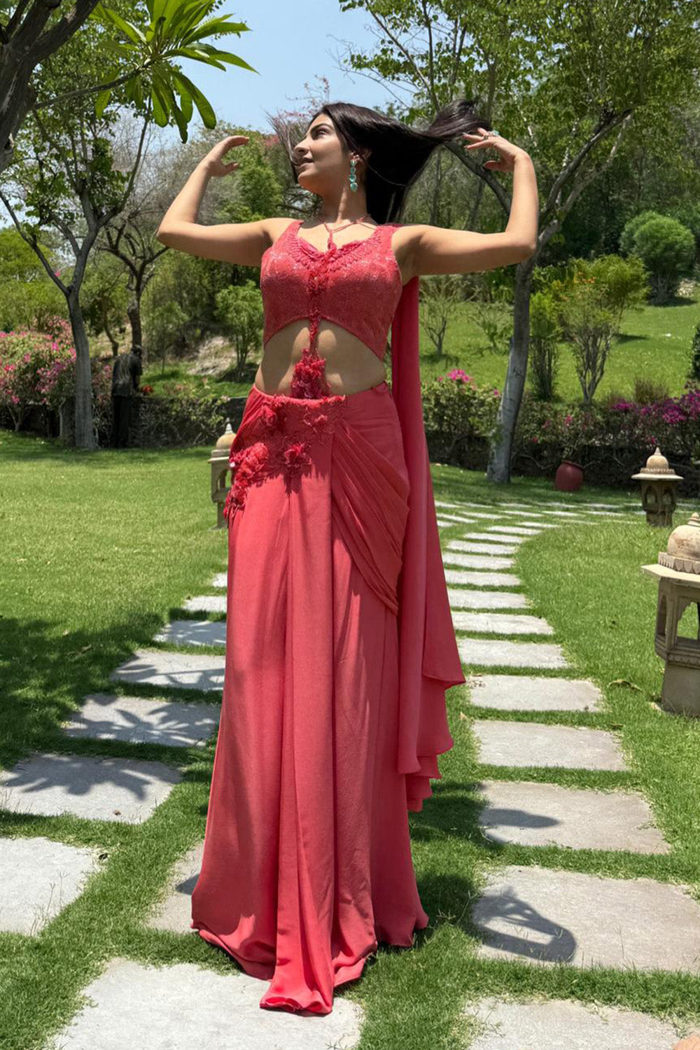 Rupali Jagga in Coral Sculpted Drape Saree