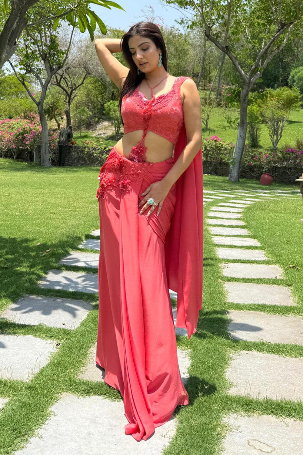 Rupali Jagga in Coral Sculpted Drape Saree