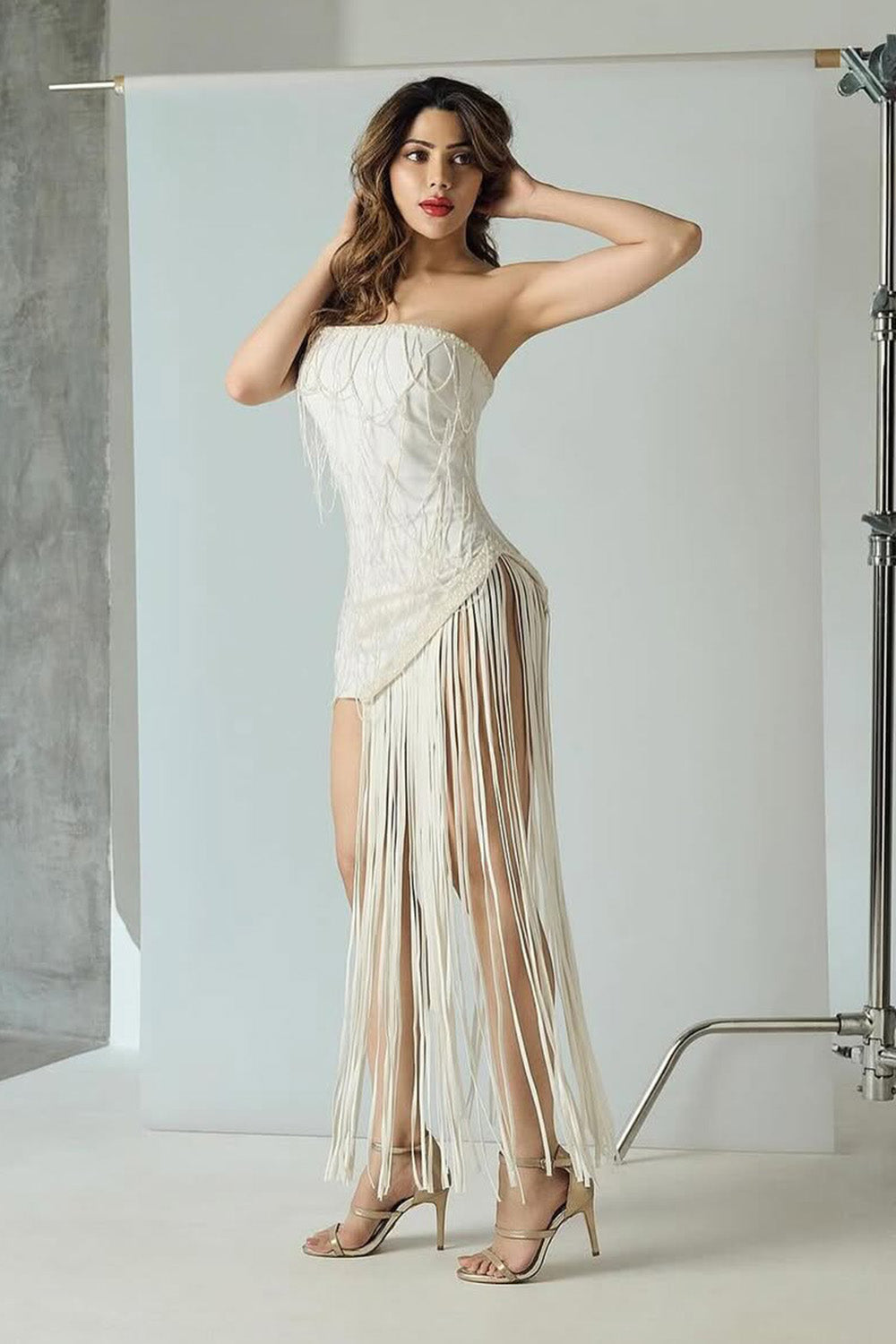 Nikki Tamboli in Ivory Short Dress with Embellishments and Cords