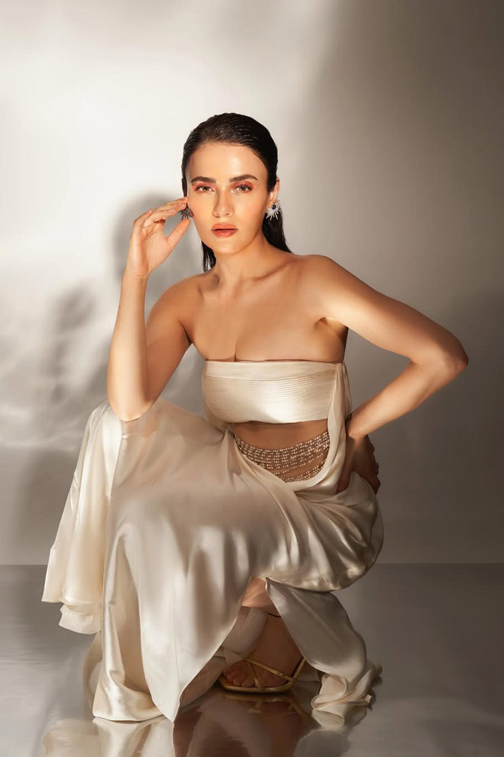 Radhika Madan in Ivory Cowl Gown with Embellishments