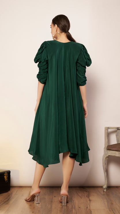 Bias dress with puff sleeves.