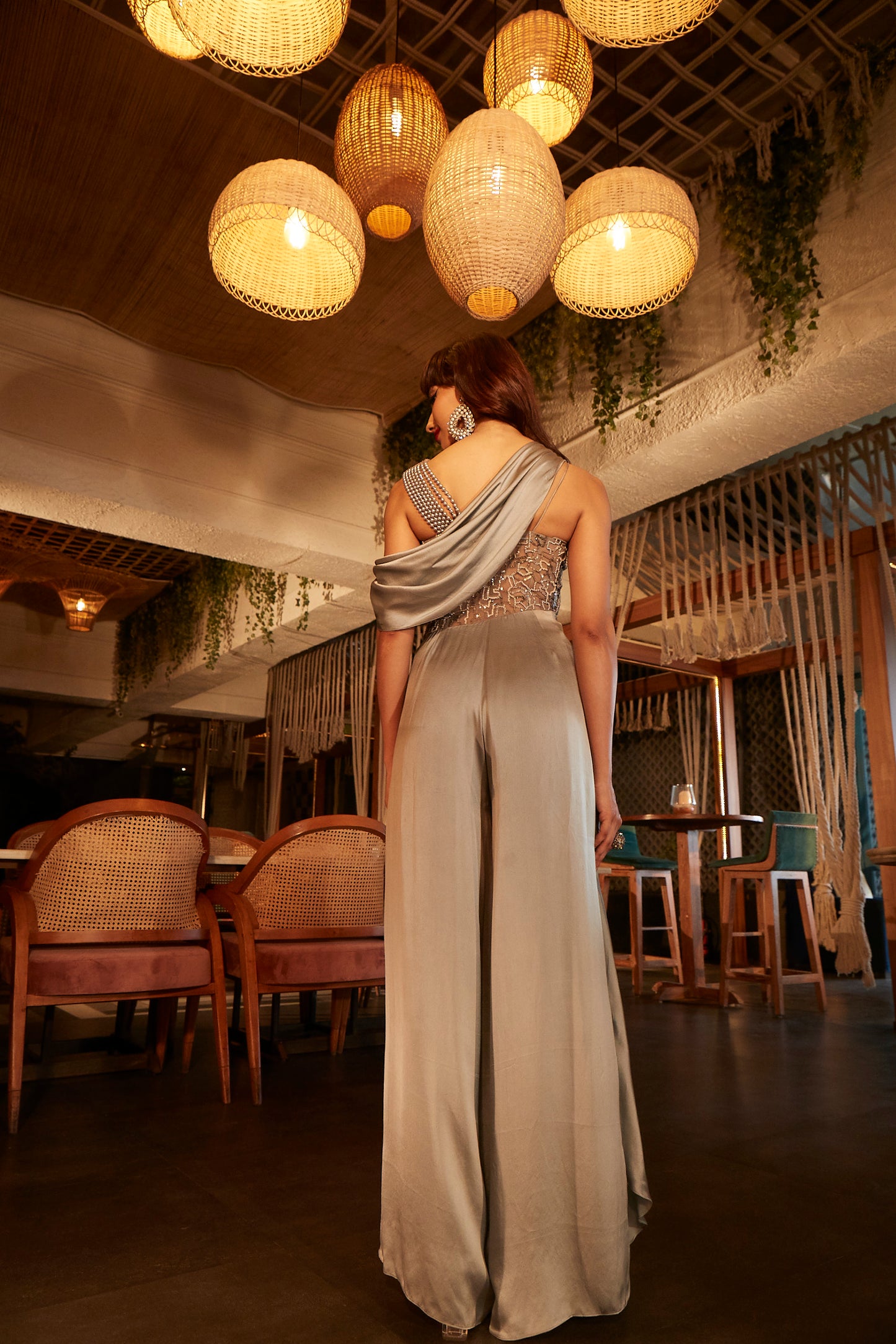Dove grey flared jumpsuit with an embroidered bodice.