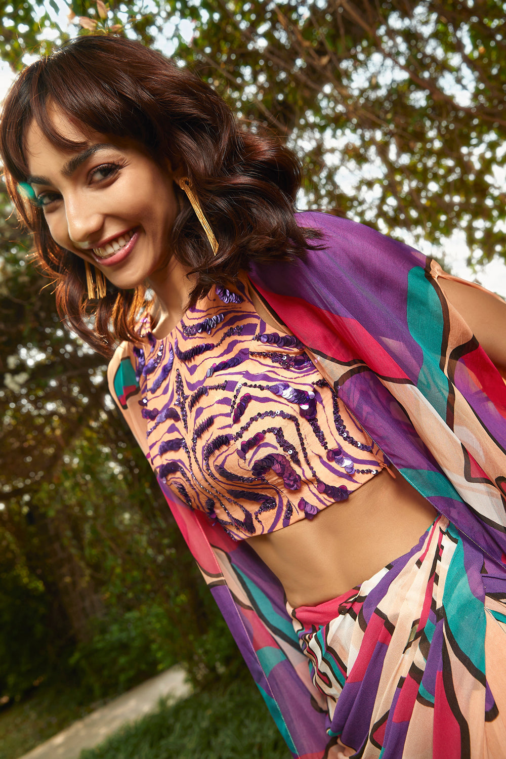 Peach fuzz printed embroidered top.