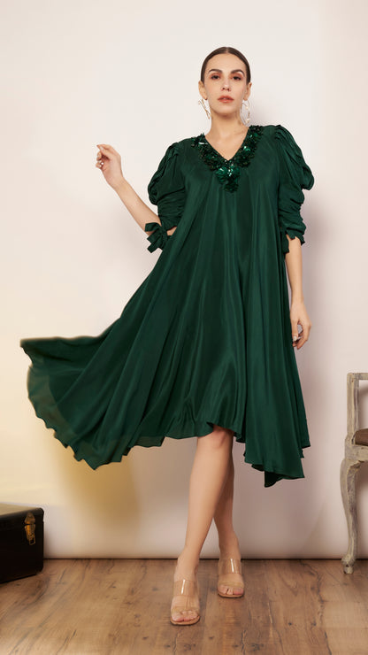 Bias dress with puff sleeves.