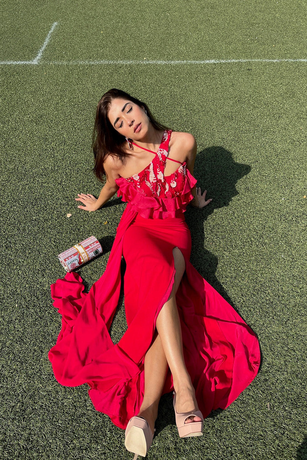 Sukhmani Gambhir and Akriti Rana in One Shoulder Scarlet Red High-Slit Ruffle Detailed Gown