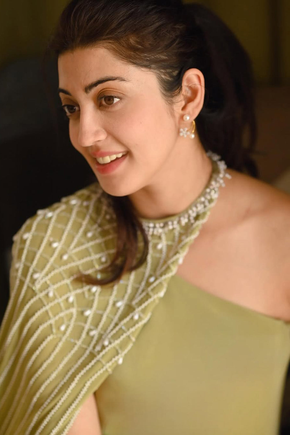 Pranita Subhash in Sage Green Gathered Skirt with One Shoulder Top and Cape