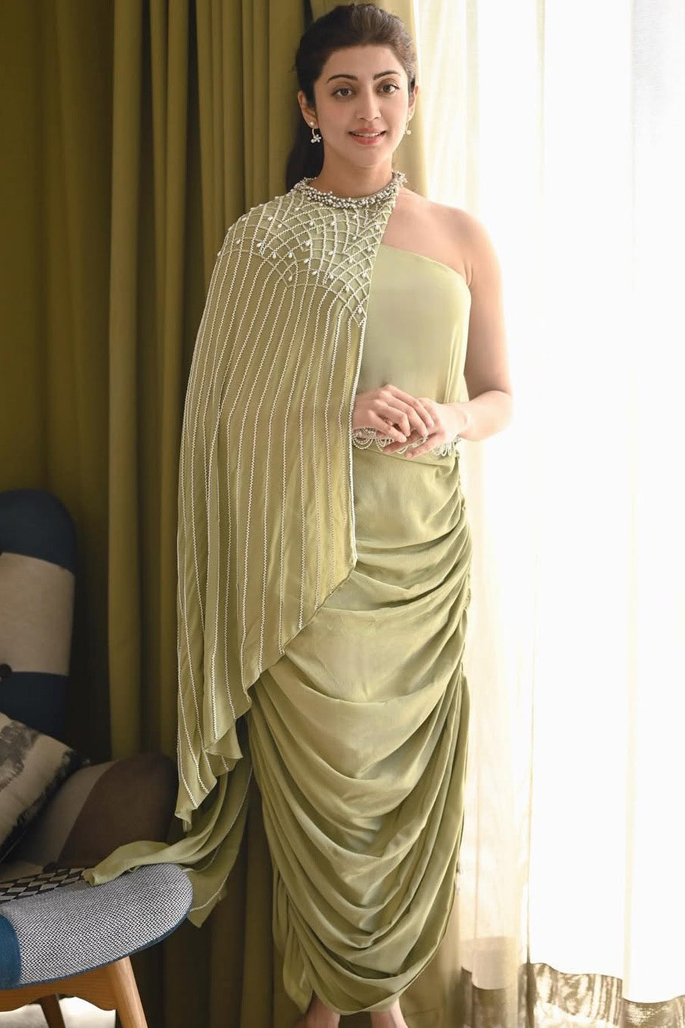 Pranita Subhash in Sage Green Gathered Skirt with One Shoulder Top and Cape