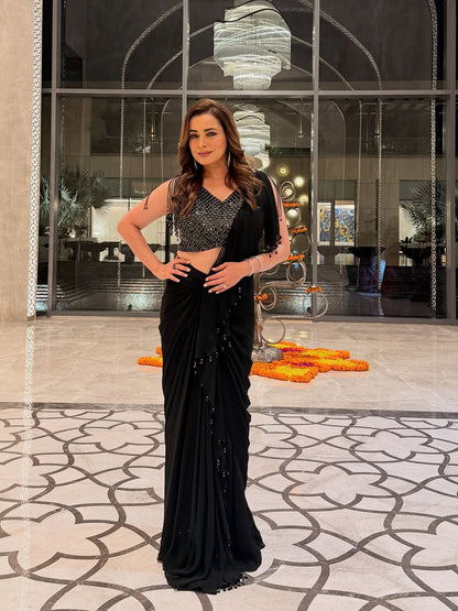 Neelam Kothari in Velvet Noir Ruffle Saree Set