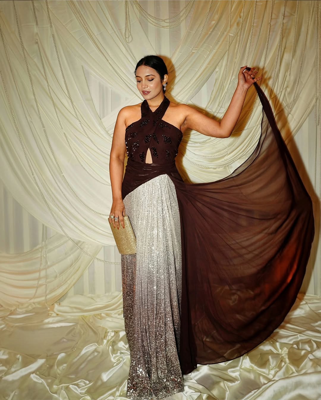 Marita Monteirro in Maroon Petal Cascade Gown