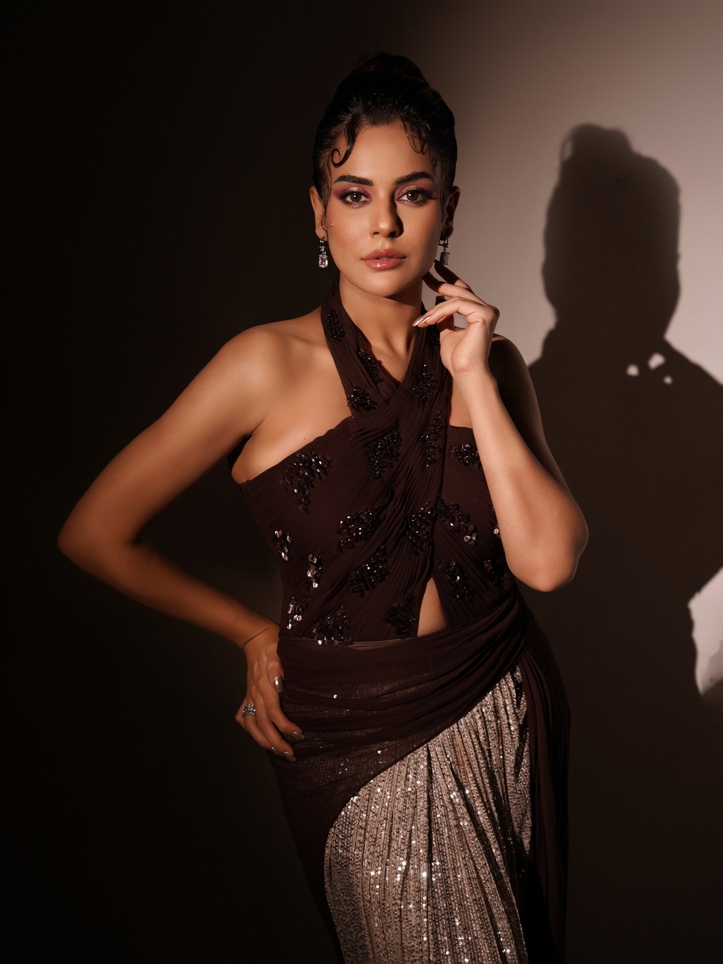 SARA ARFEEN KHAN IN WINE PETAL DRAPED GOWN