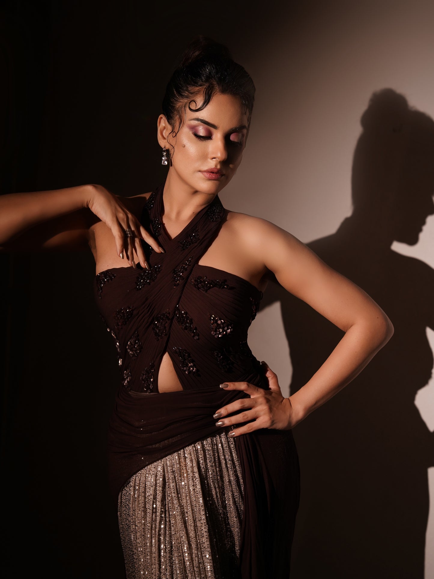 SARA ARFEEN KHAN IN WINE PETAL DRAPED GOWN