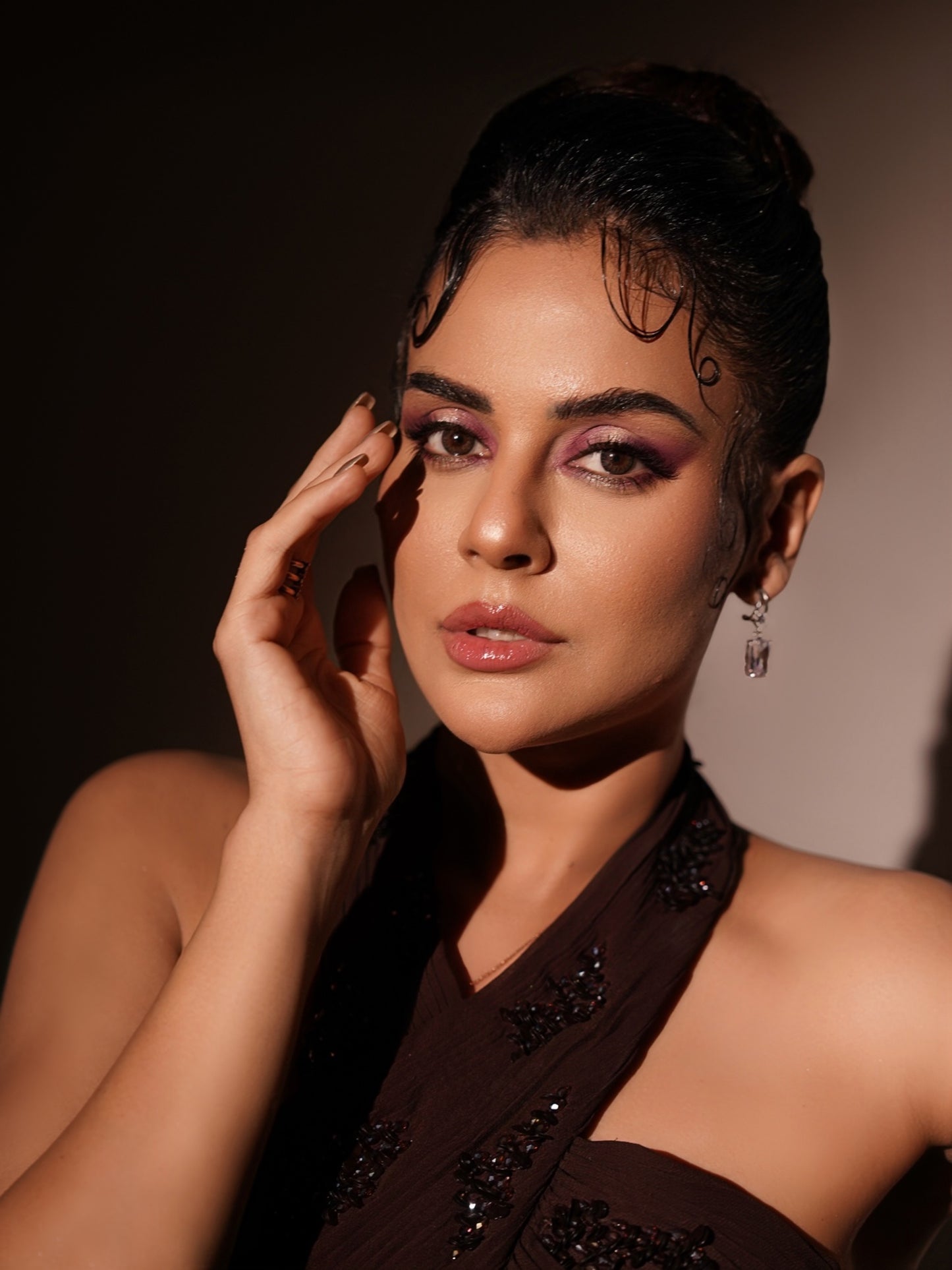 SARA ARFEEN KHAN IN WINE PETAL DRAPED GOWN