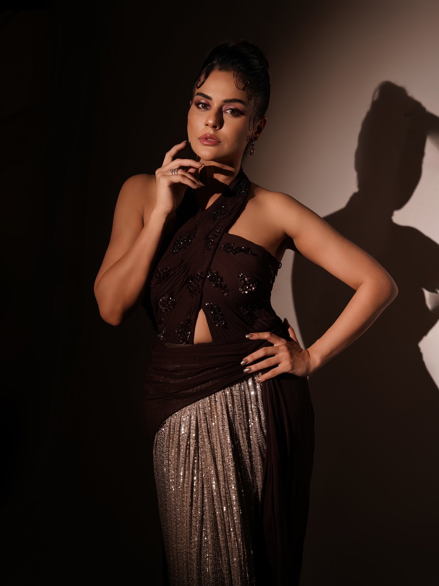 SARA ARFEEN KHAN IN WINE PETAL DRAPED GOWN