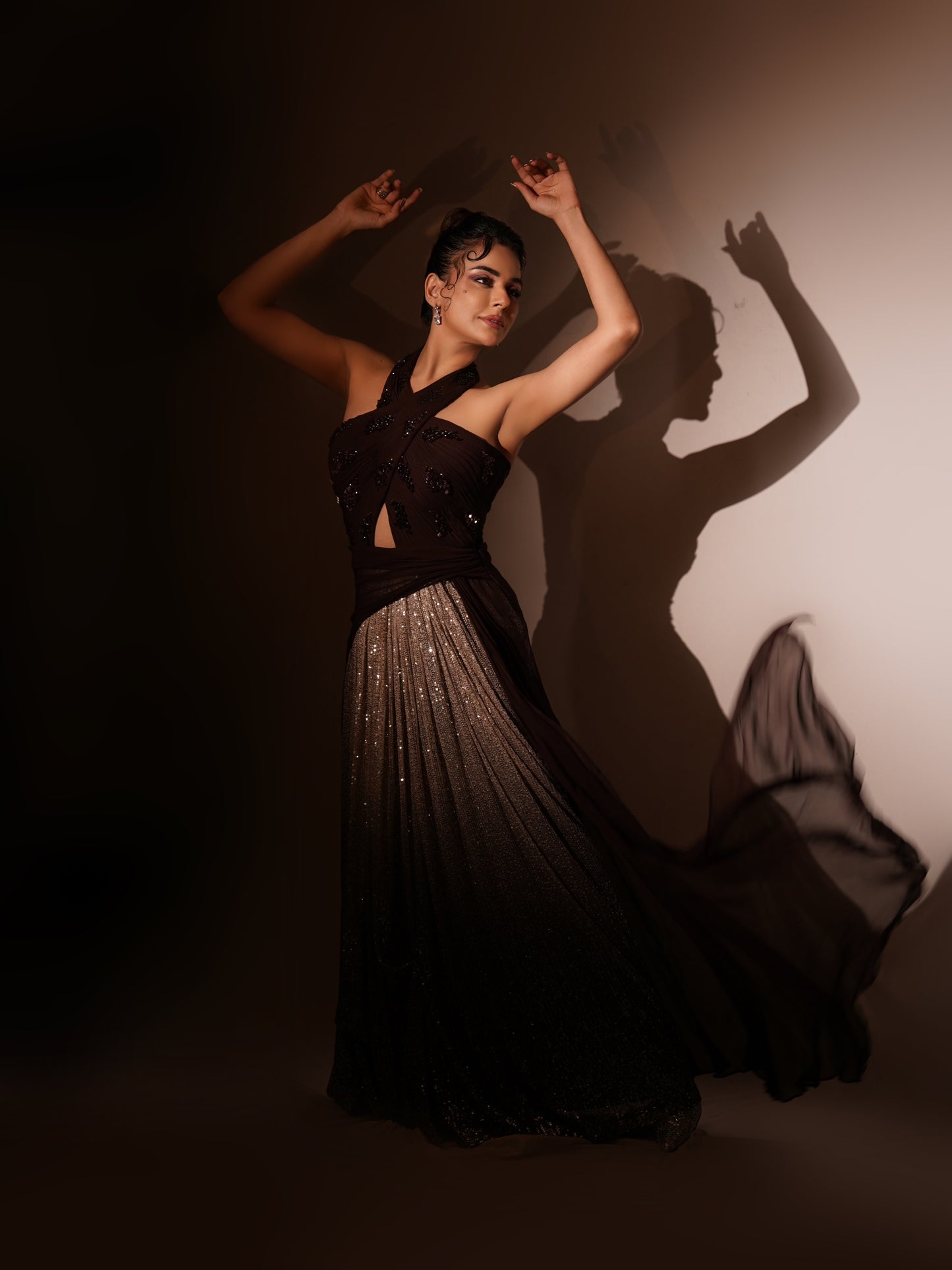 SARA ARFEEN KHAN IN WINE PETAL DRAPED GOWN