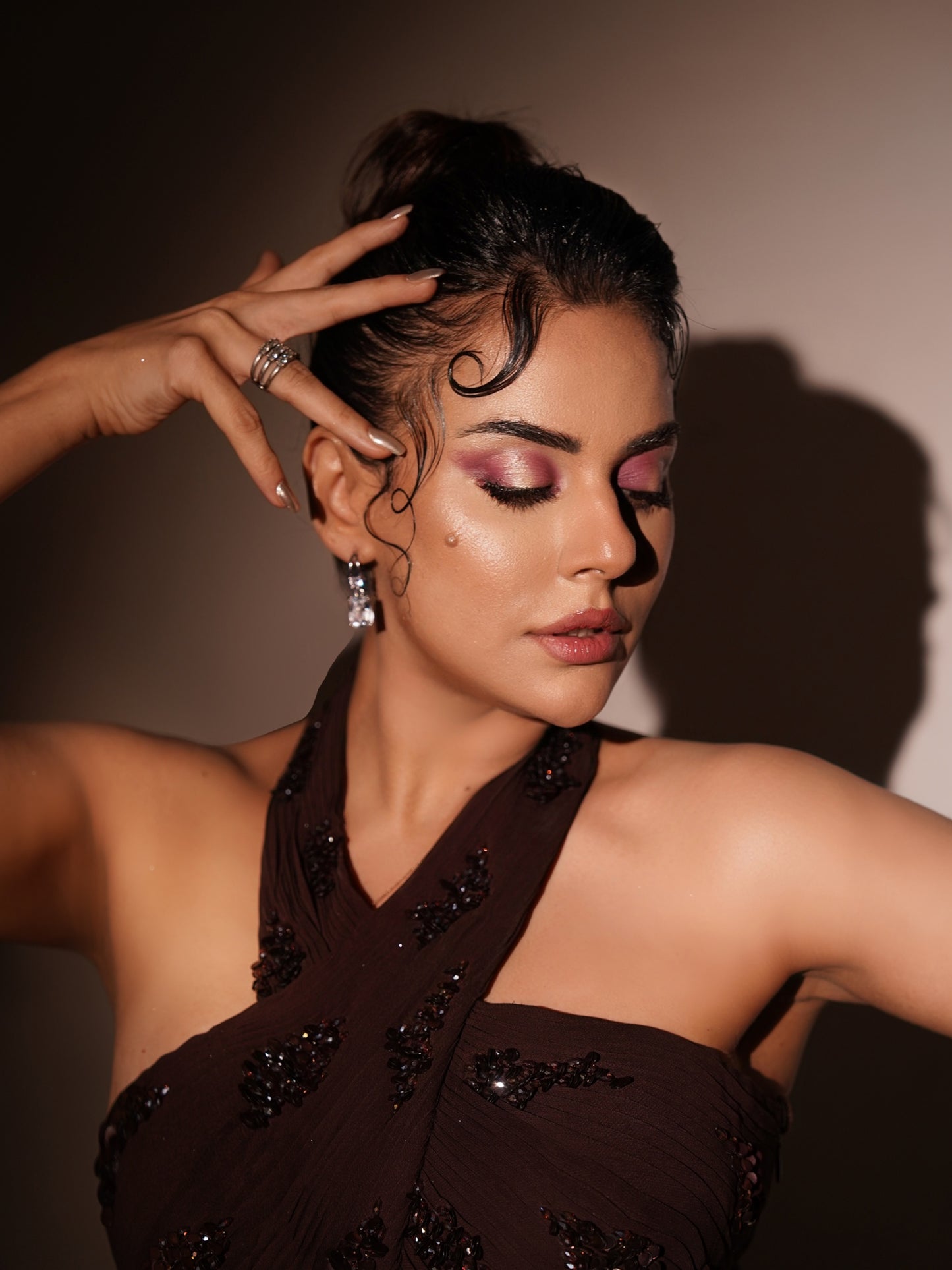 SARA ARFEEN KHAN IN WINE PETAL DRAPED GOWN