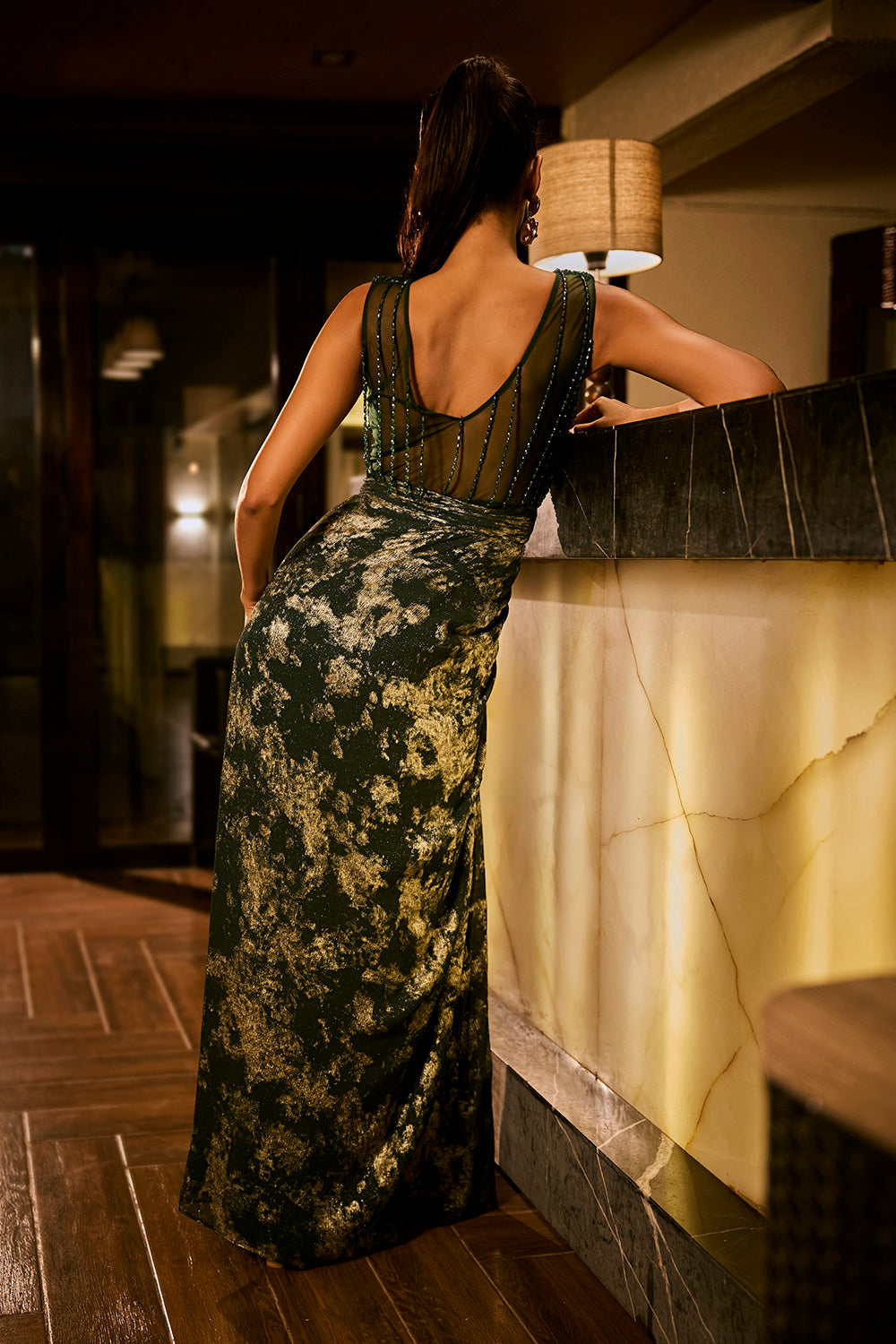 Emerald green embellished gown