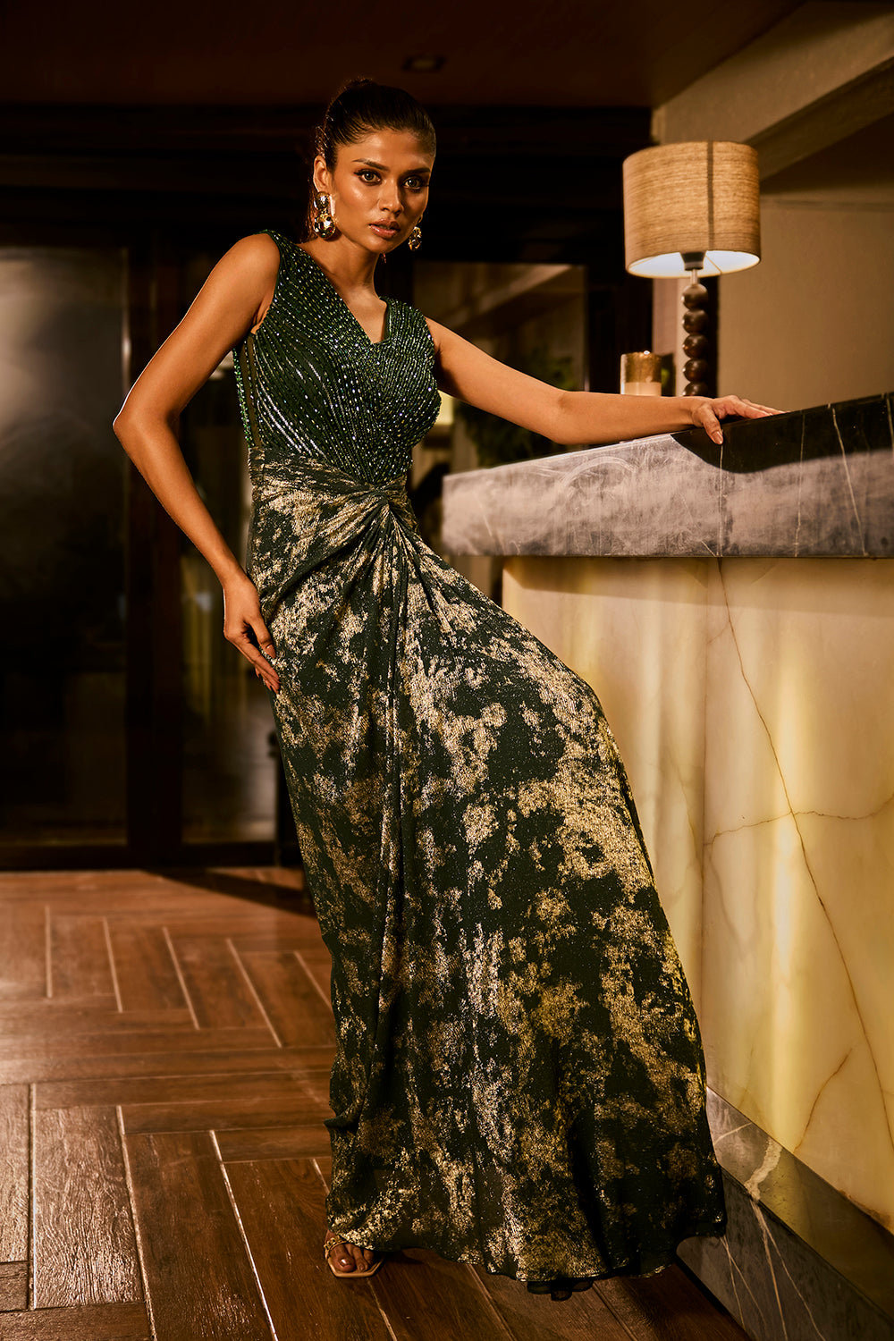 Emerald green embellished gown