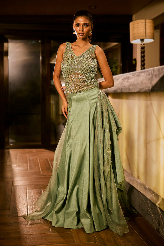 Mint green lehenga set with an embellished blouse