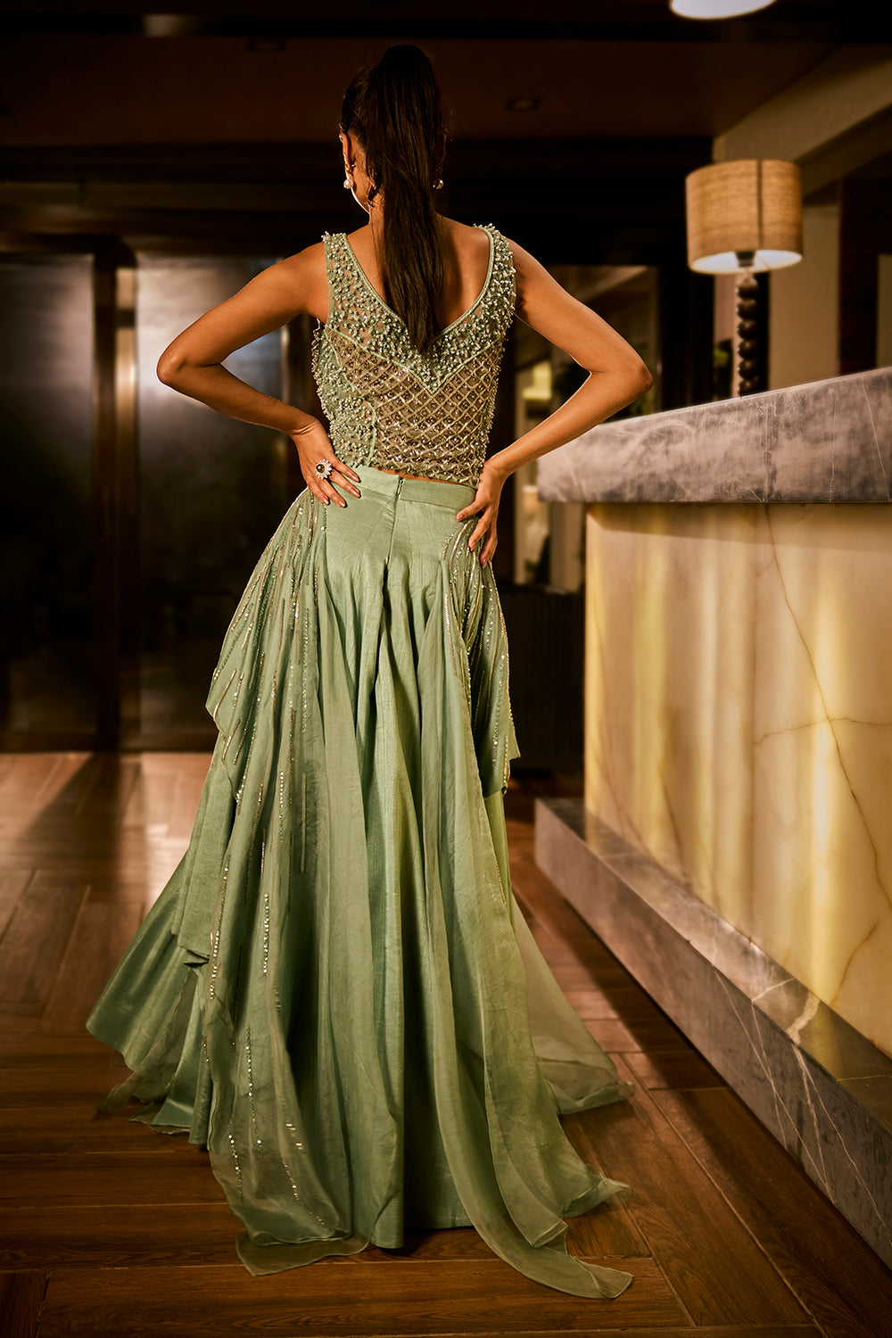 Mint green lehenga set with an embellished blouse