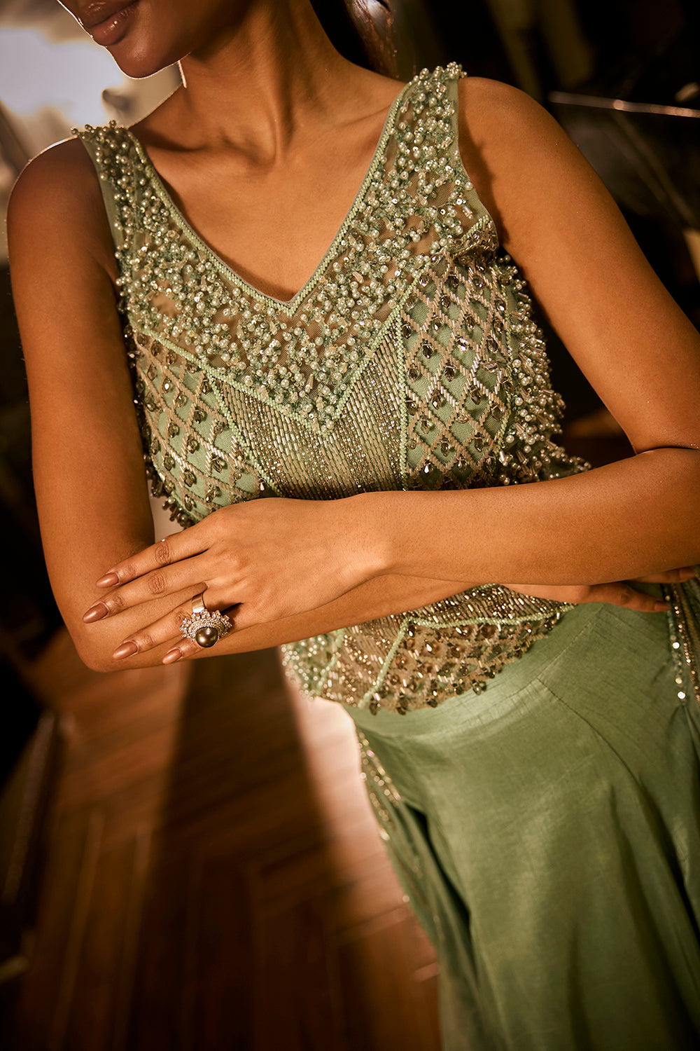 Mint green lehenga set with an embellished blouse