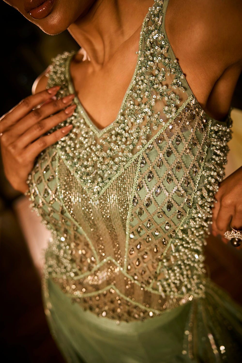 Mint green lehenga set with an embellished blouse